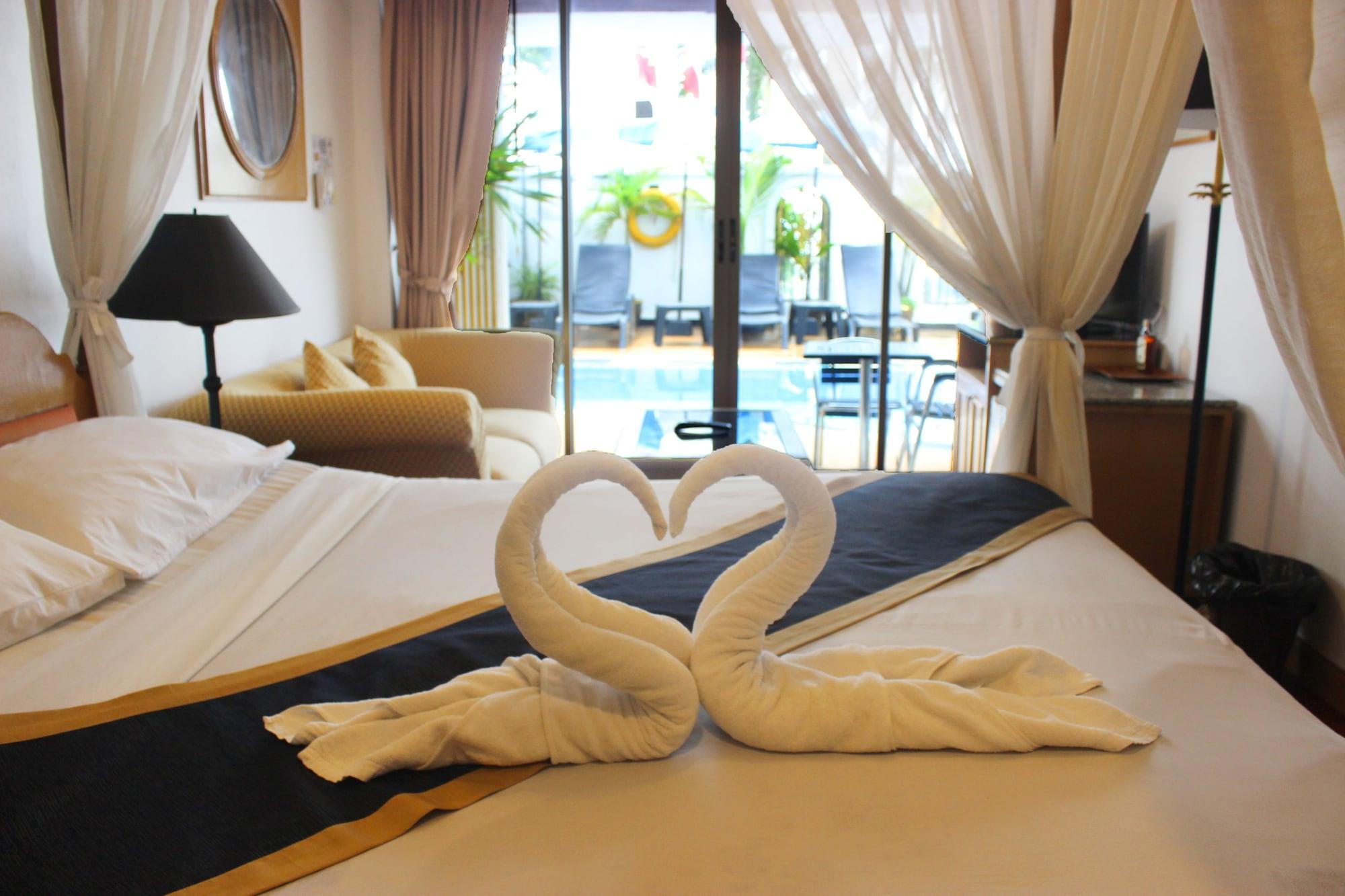 The Orchid Hotel Kalim Bay Patong Exterior foto